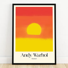 Framed art print of a vibrant yellow and orange sunset with 'Andy Warhol Sunset' text