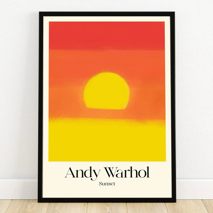 Framed art print of a vibrant yellow and orange sunset with 'Andy Warhol Sunset' text