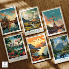 Set of six framed travel art prints featuring Venice, The Highlands, Paris, Singapore, Waterton Lakes, and Sri Lanka, displayed on a wooden floor.