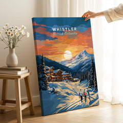 Whistler British Columbia travel poster with snowy mountain sunset and skiers, leaning on floor.