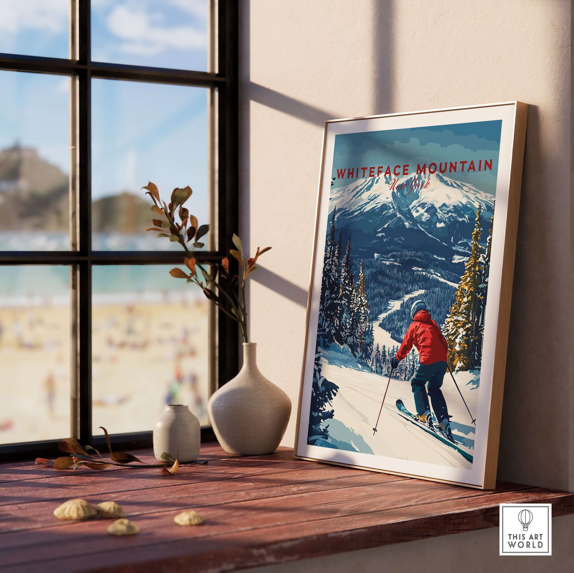 Whiteface Mountain print featuring a skier in a red jacket, framed on a windowsill with a scenic view.