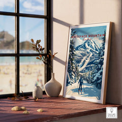 Whiteface Mountain ski poster framed on a shelf, featuring a skier on a snow-covered slope with a beautiful mountain backdrop.