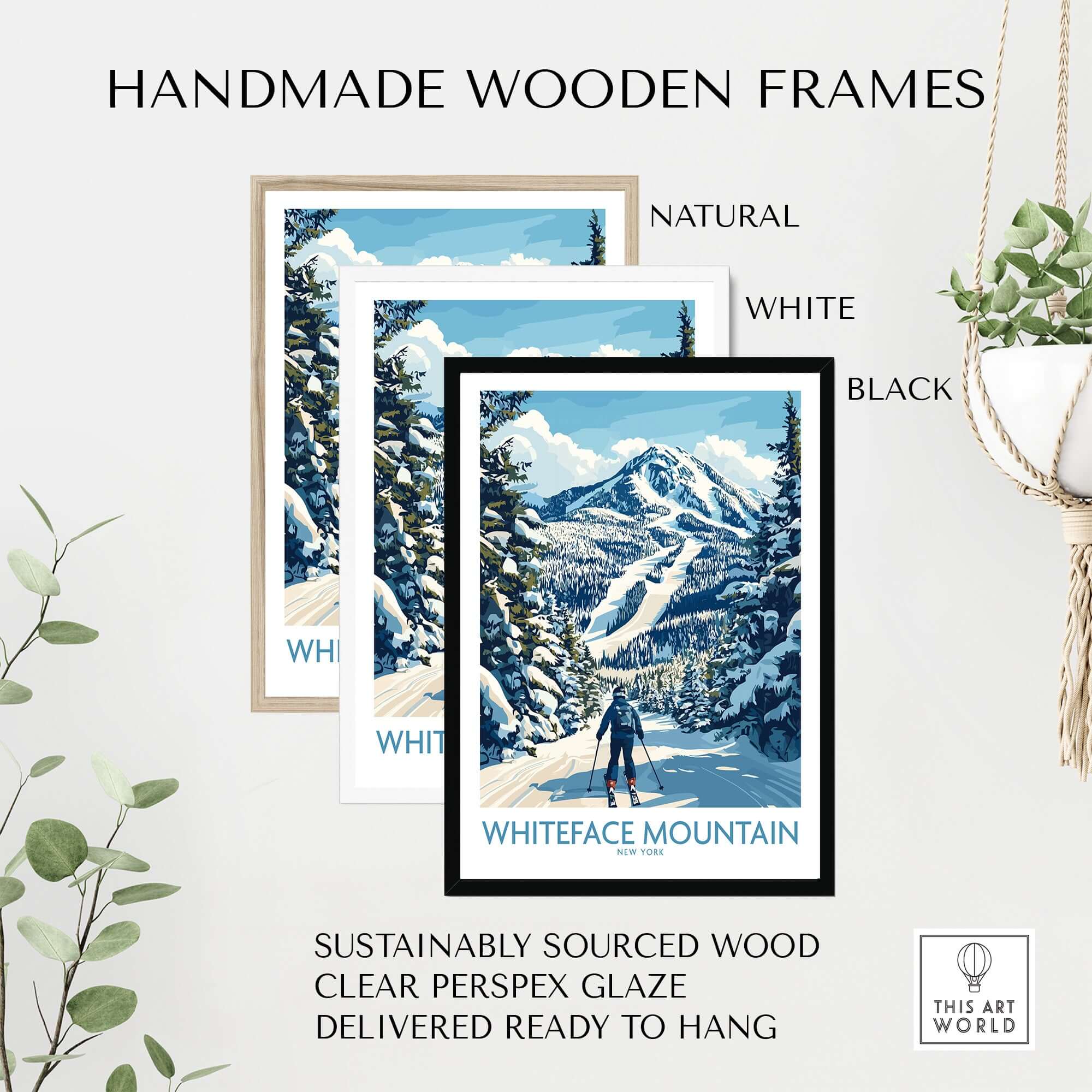 Handmade wooden frames for Whiteface Mountain art print in natural, white, and black finishes, showcasing a skiing scene.