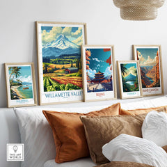Willamette Valley Oregon Poster among other travel-themed posters on a stylish shelf with decorative pillows.