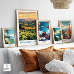 Willamette Valley Poster among framed travel posters on a stylish shelf with decorative pillows.