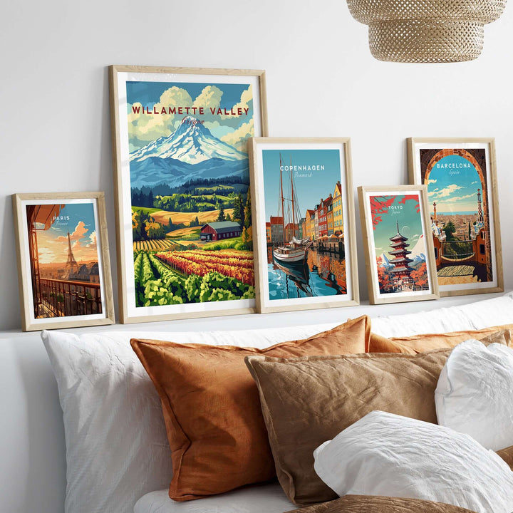 Framed Willamette Valley wall art featuring scenic landscapes, vineyards, and rustic charm on a stylish bed display.