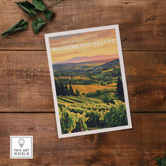 Willamette Valley Print showcasing a beautiful vineyard landscape at sunset on a wooden table.