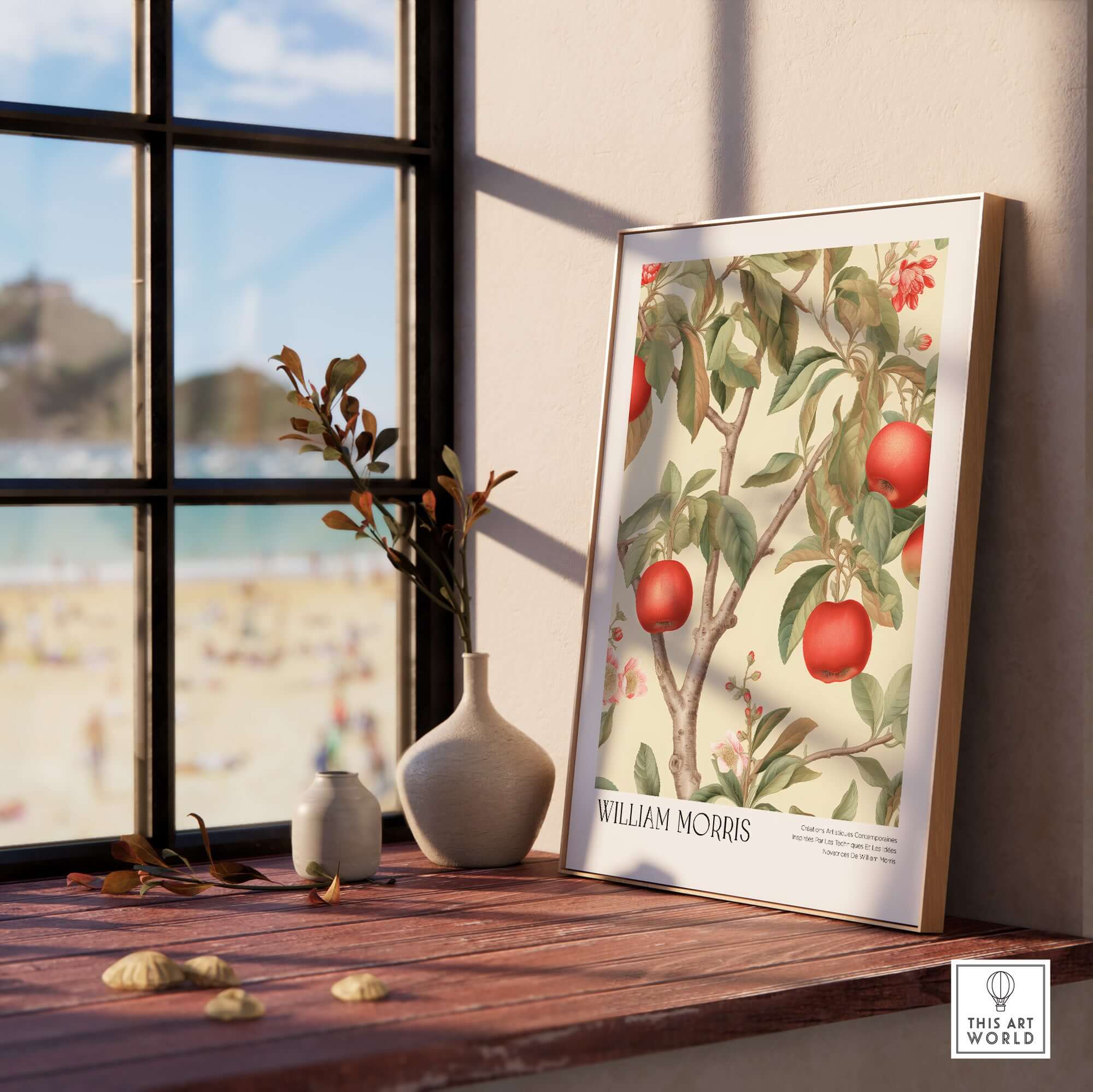 William Morris Prints - Apple Tree Fruit Botanical Art Print - Orchard Blossom Poster displayed on a windowsill with a beach view.