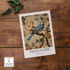 William Morris Prints - Blue Bird Floral Art Print - Botanical Poster on a rustic wooden background.