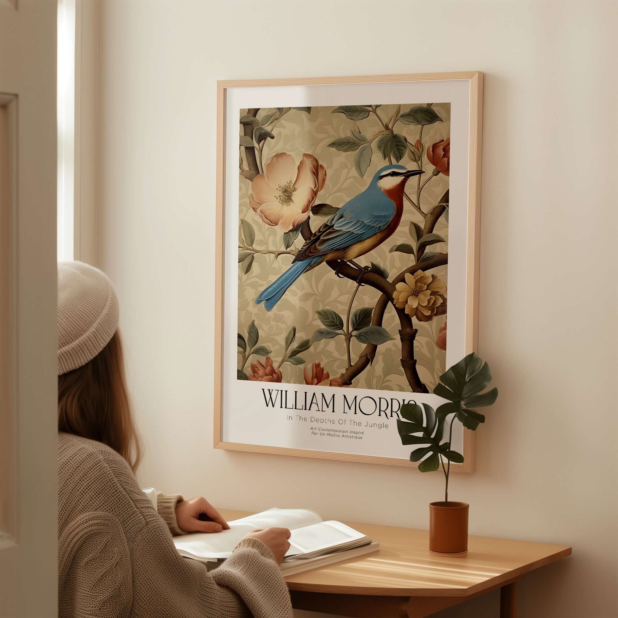 William Morris Prints - Blue Bird Floral Art Print - Botanical Poster displayed on a wall in a cozy room.