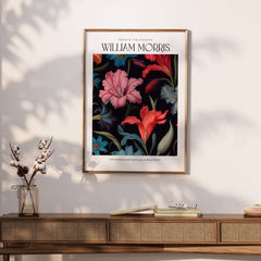 William Morris Prints - Dark Floral Lily Art Print - Vibrant Botanical Poster on a wall with flowers and leaves design.