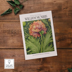William Morris Prints - Large Floral Bloom Art Print - Botanical Poppy Poster on a wooden surface with green leaves.