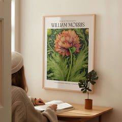 William Morris Prints - Large Floral Bloom Art Print - Botanical Poppy Poster displayed on a wall with a person admiring it.