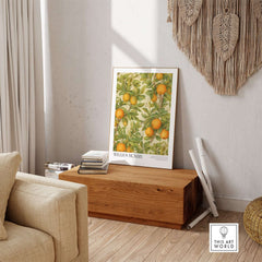 William Morris Prints - Orange Grove Fruit Tree Art Print - Botanical Poster displayed in a cozy living room setting.