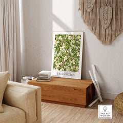 William Morris Prints - White Blossom Branch Art Print - Exhibition Poster displayed in a stylish living room setting.