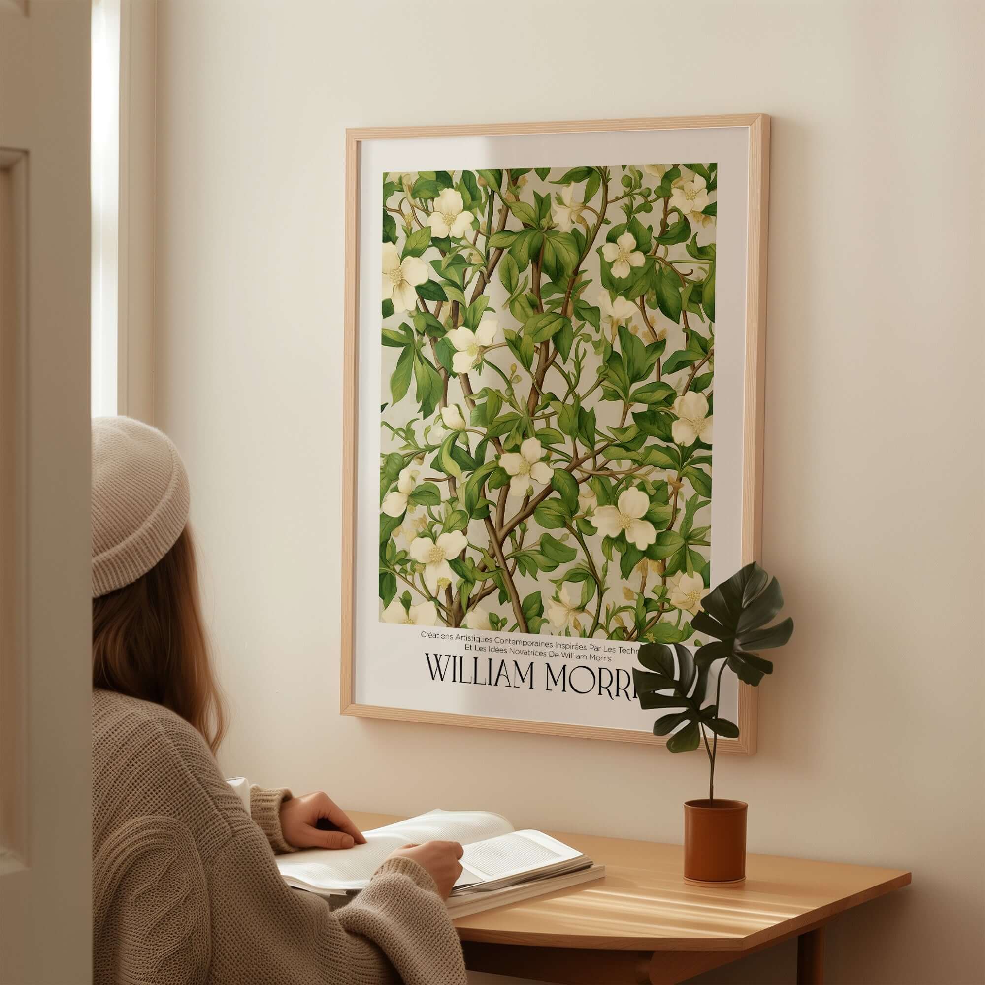 William Morris Prints - White Blossom Branch Art Print - Exhibition Poster displayed in a cozy interior setting.