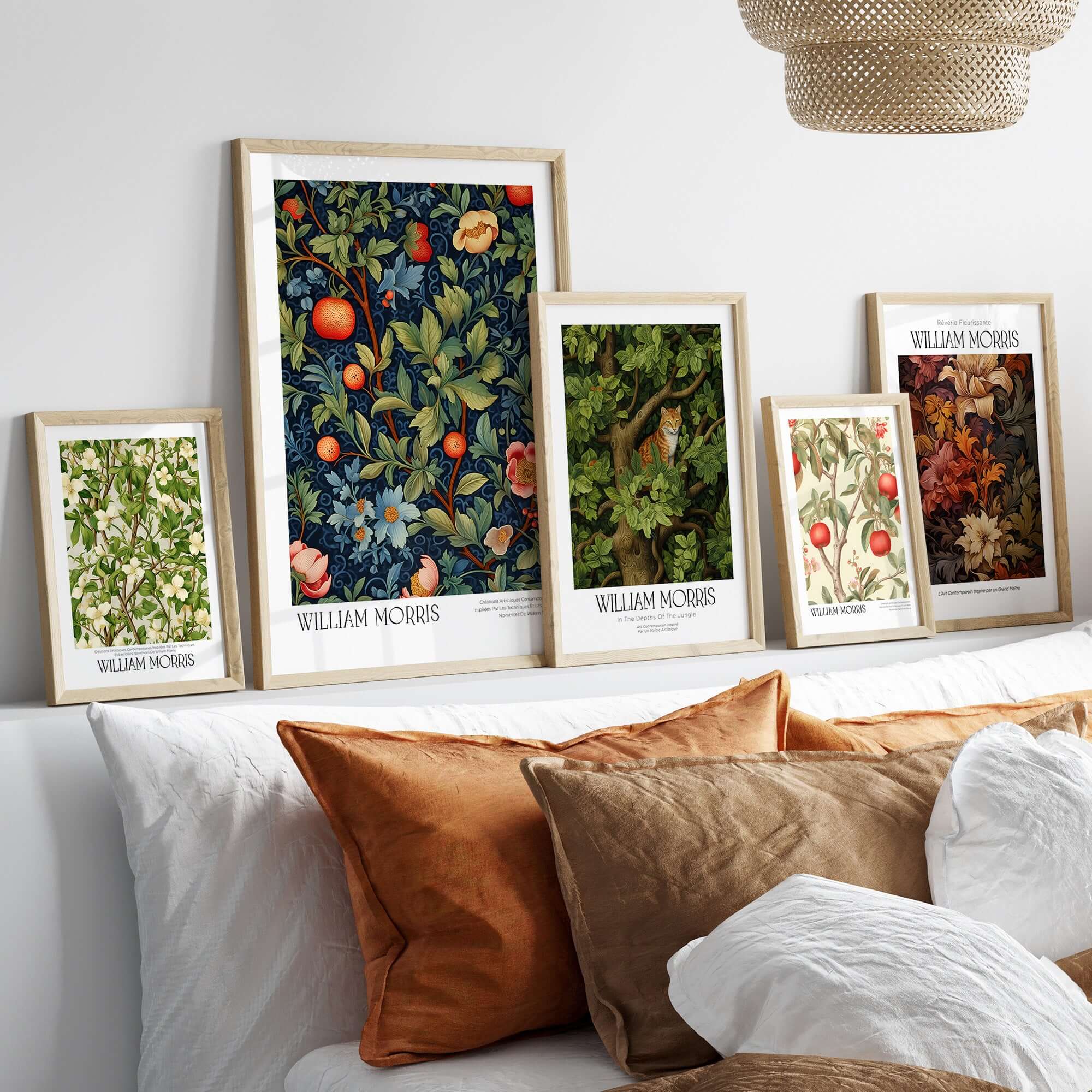William Morris William Morris Fruit and Floral Vine Art Print - Dark Botanical Poster displayed on a couch.