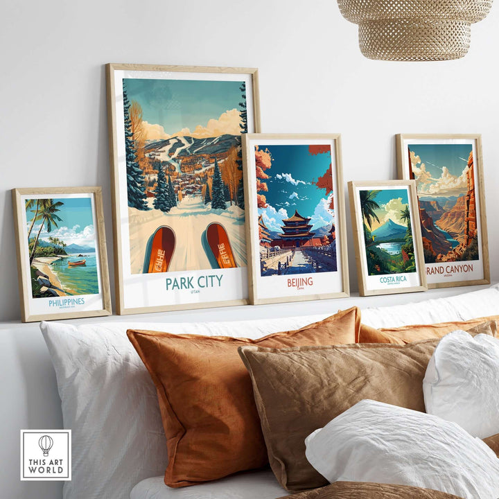 Colorful winter sports posters featuring Park City, Utah, and other destinations displayed in a stylish living room setting.