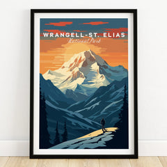 Wrangell-St. Elias National Park art print in black frame on wooden floor, mountain sunset scene