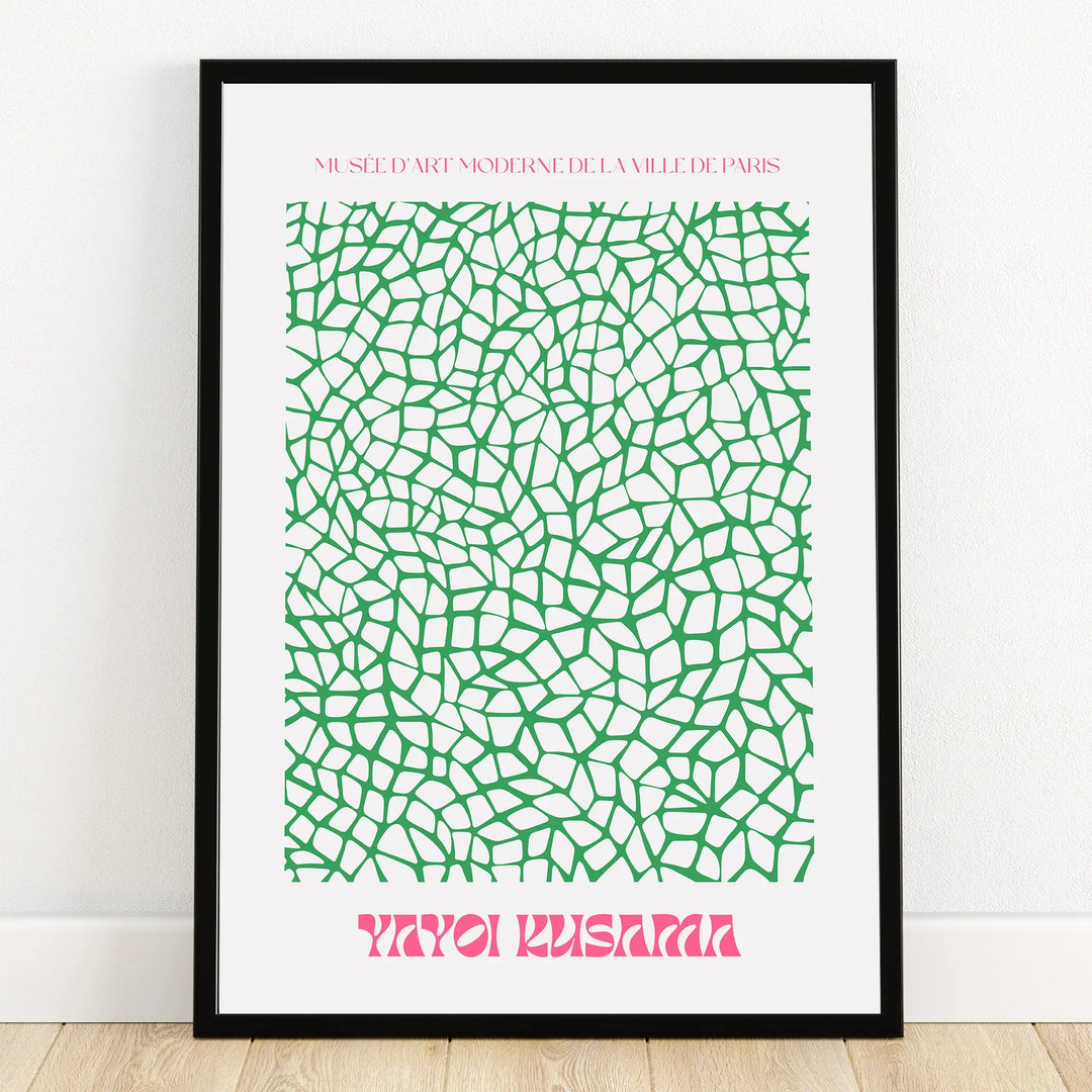Framed modern art print with abstract green mosaic pattern and pink text on white background