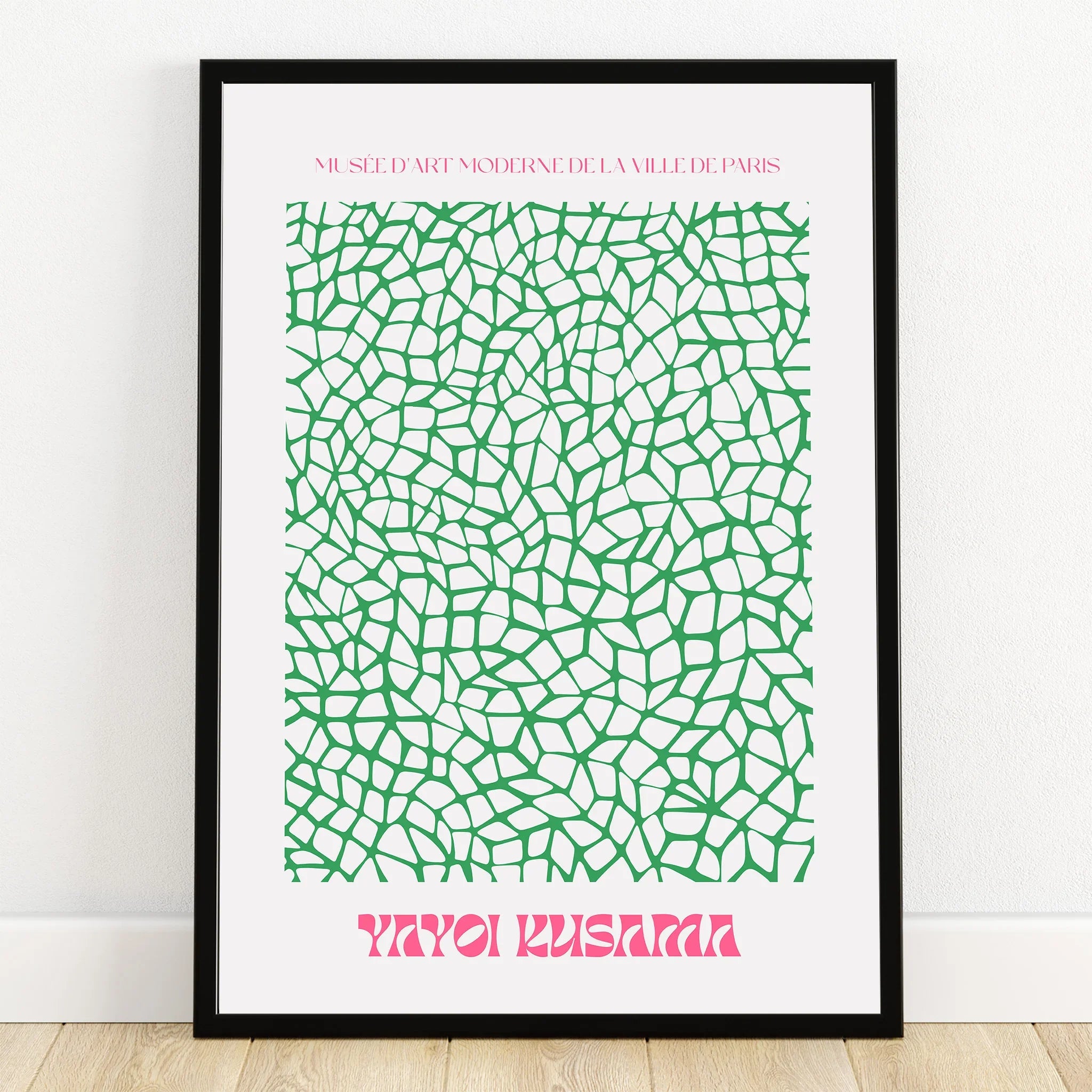 Framed modern art print with abstract green mosaic pattern and pink text on white background