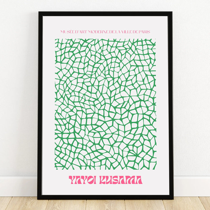 Framed modern art print with abstract green mosaic pattern and pink text on white background