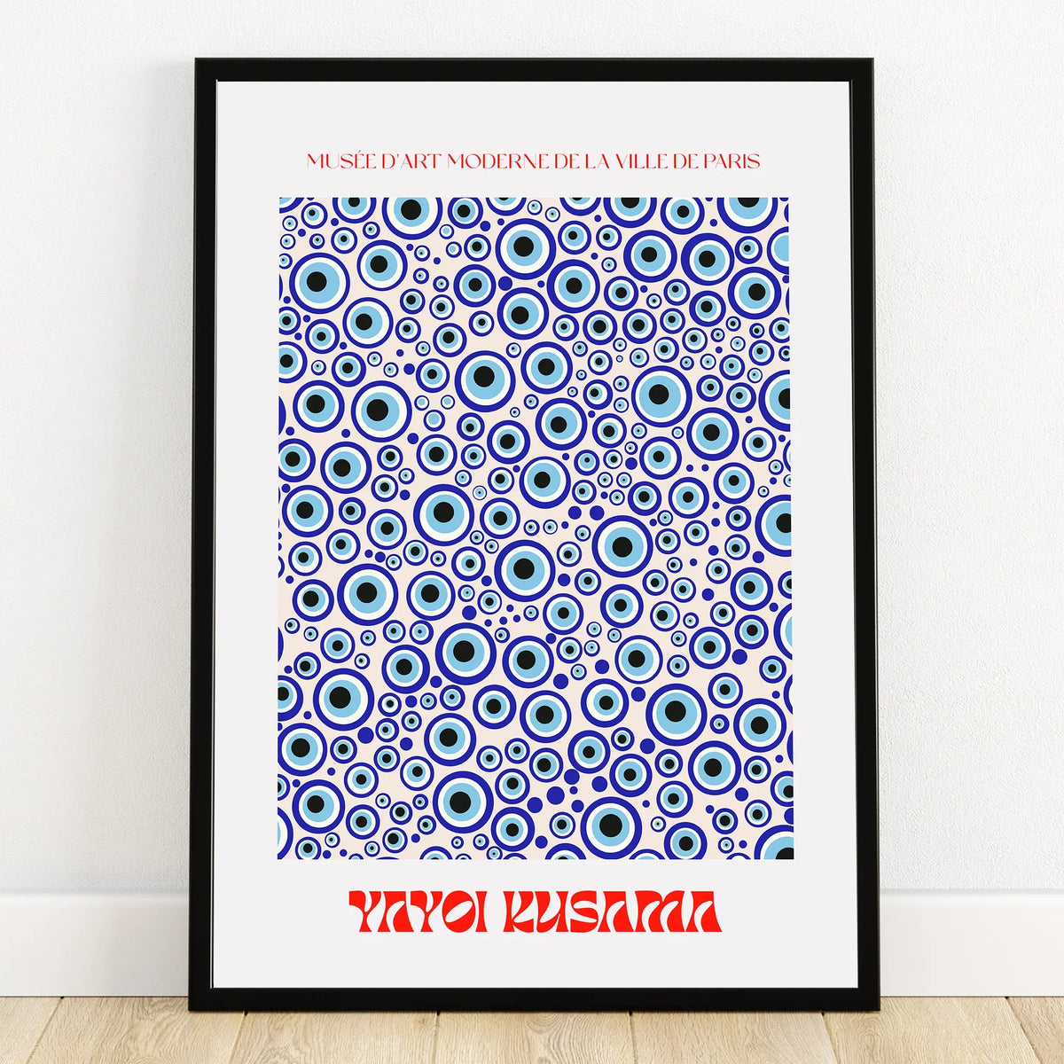 Framed abstract wall art print with blue concentric circles and modern typography.