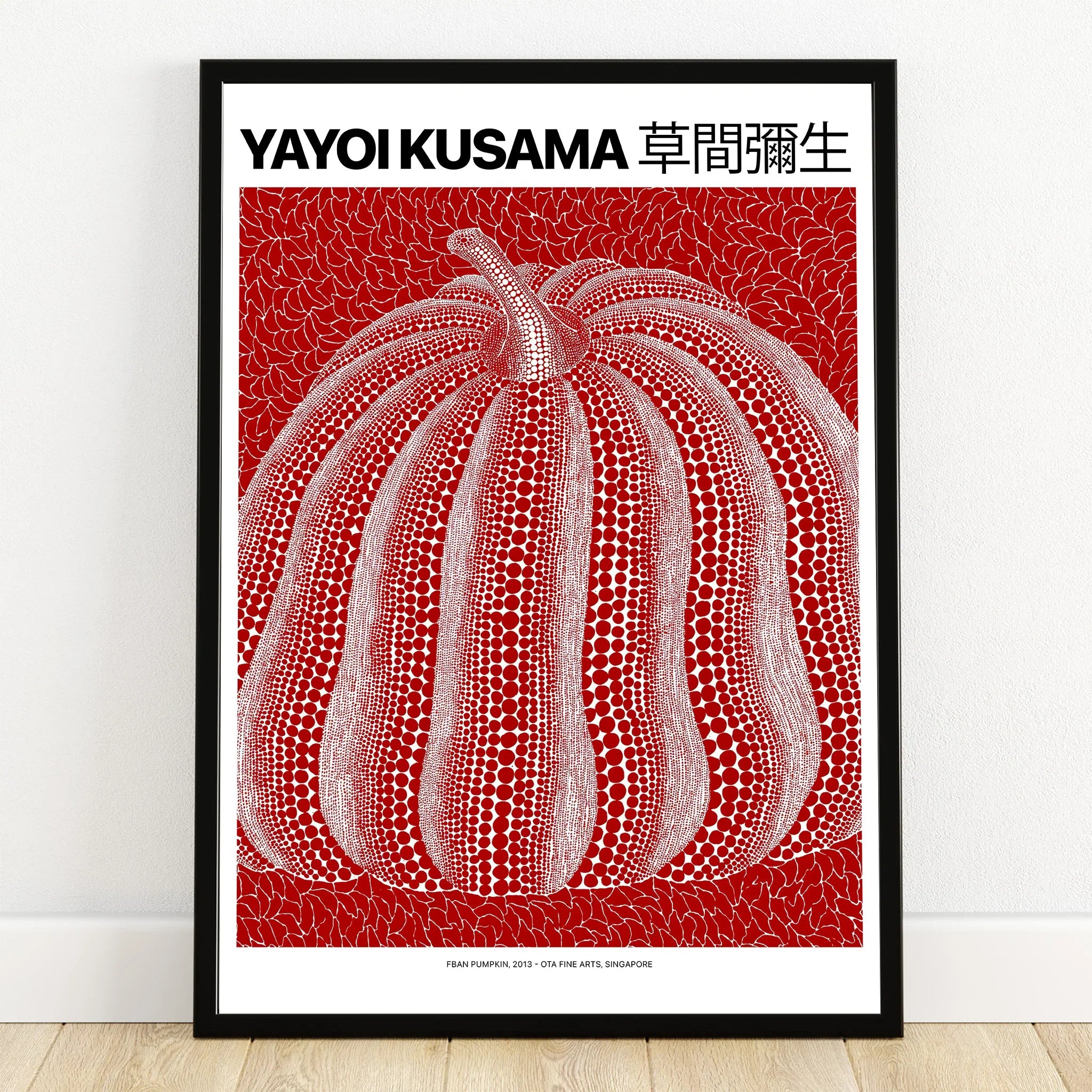 Modern wall art poster with red and white dotted pumpkin in black frame, minimalist decor