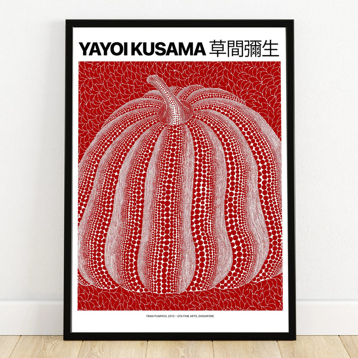 Modern wall art poster with red and white dotted pumpkin in black frame, minimalist decor