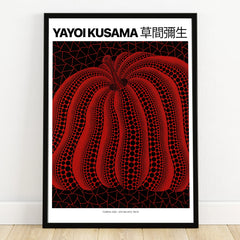 Framed wall art print of a red pumpkin with black dots on a geometric background