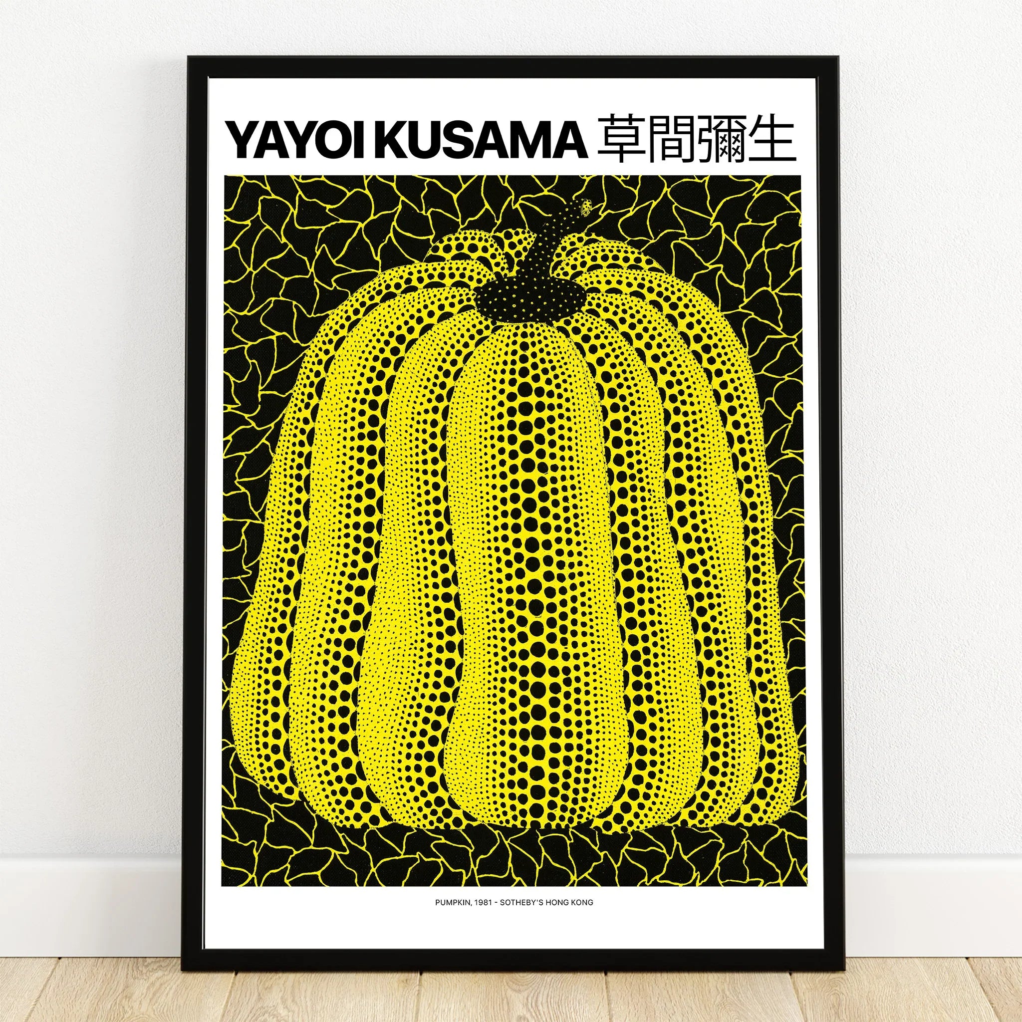 Framed wall art print featuring a yellow dot pumpkin with black background and bold lines
