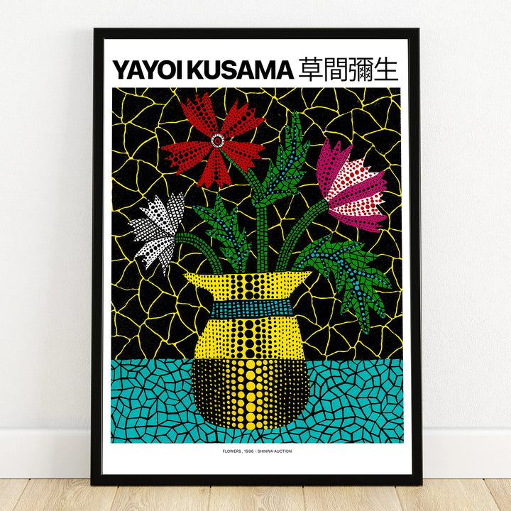 Colorful floral wall art print with dotted vase and vibrant flowers in black frame