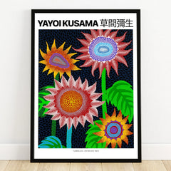 Colorful polka dot flower art print with bold blooms and green leaves in a black frame