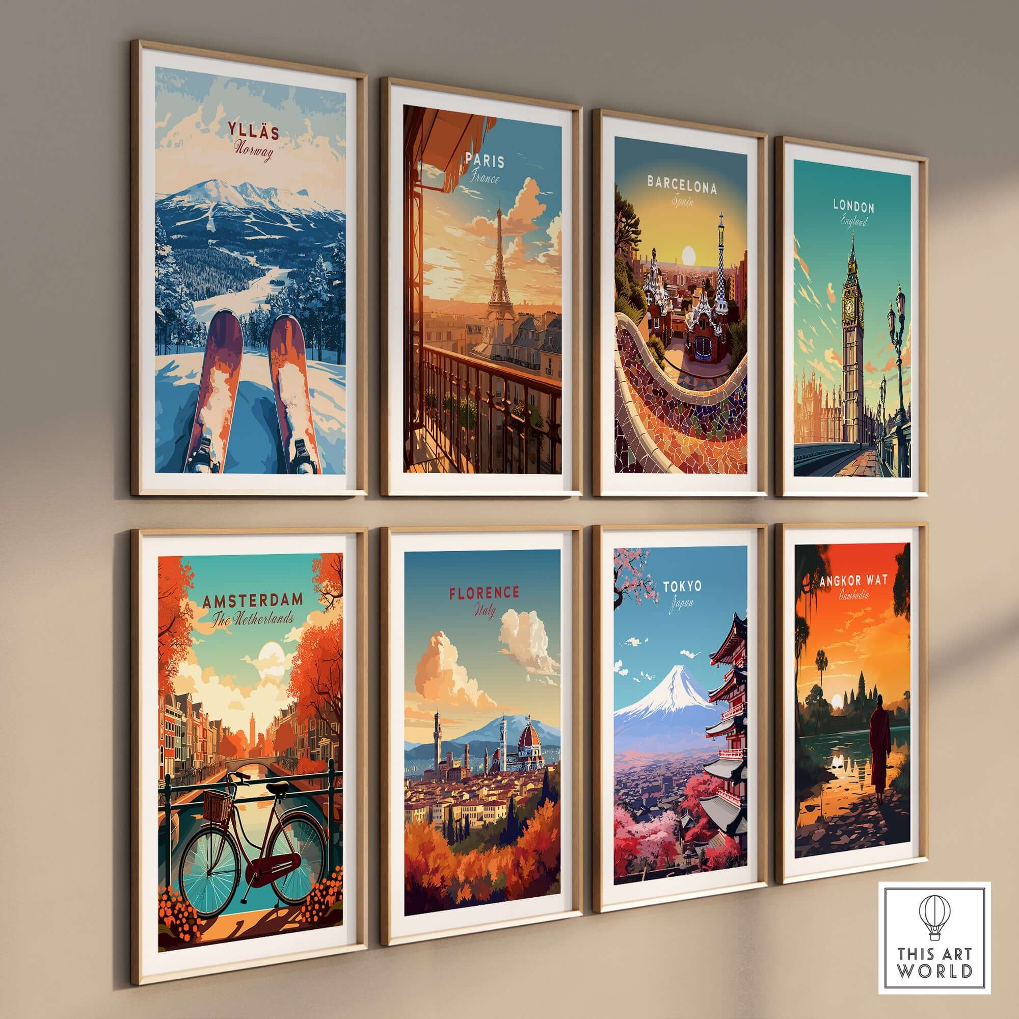 Gallery wall featuring travel art prints from Ylläs, Paris, Barcelona, London, Amsterdam, Florence, Tokyo, and Angkor Wat.
