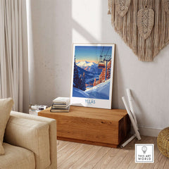 Ylläs Norway wall art print featuring a ski chairlift against a snowy mountain landscape in a cozy indoor setting.