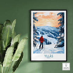 Ylläs Norway wall art featuring a skier on snowy slopes under a colorful sunset sky.