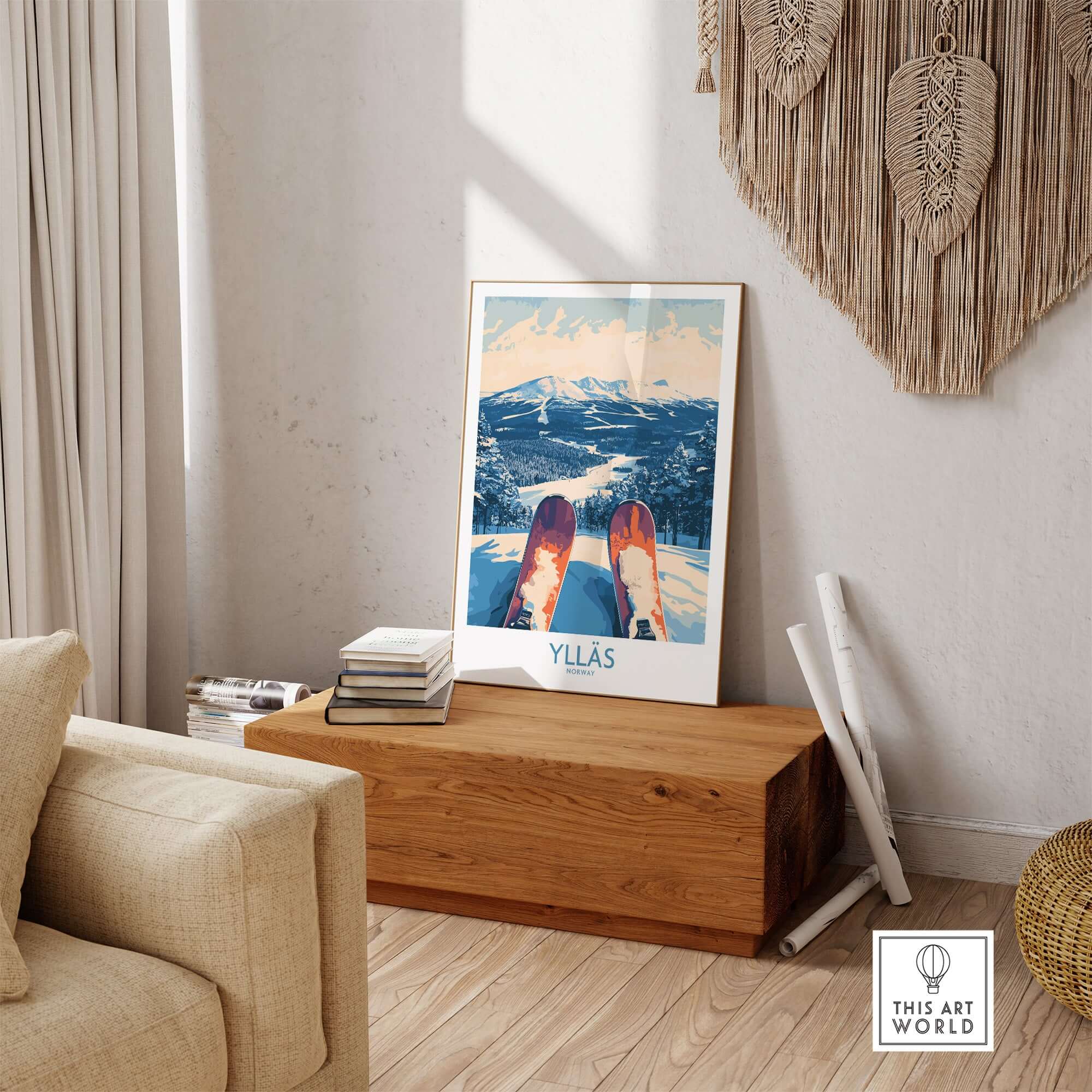 Ylläs winter poster showcasing skiing view from above on a wooden table in a cozy living room setting.