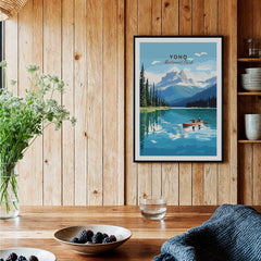Framed Yoho National Park art print in rustic kitchen with wood walls and fresh berries