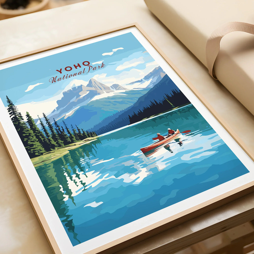 Framed Yoho National Park art print with lake, canoe, mountains and pine trees, unwrapped as a gift