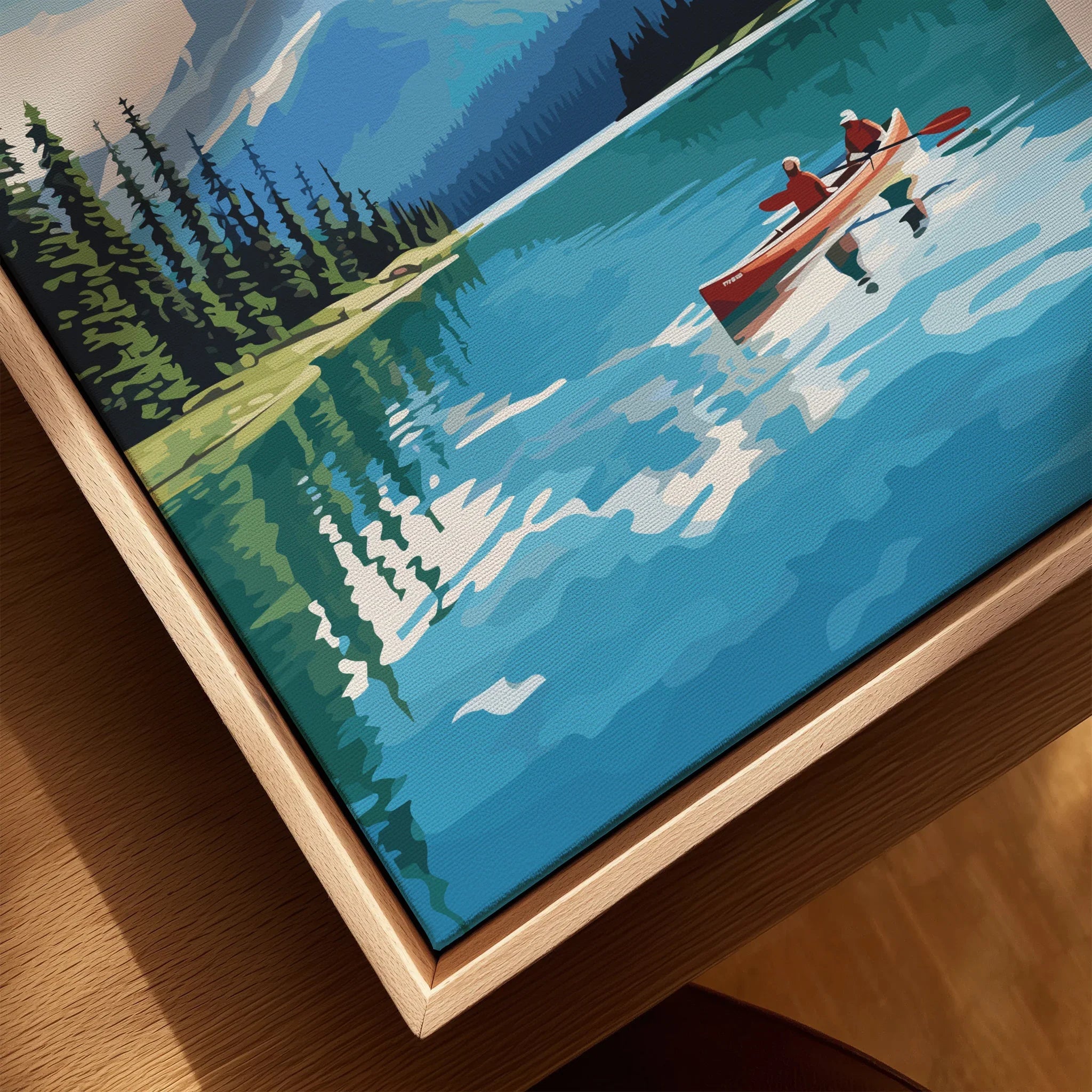 Framed canvas wall art of a lake scene with two people canoeing and pine trees by the water.