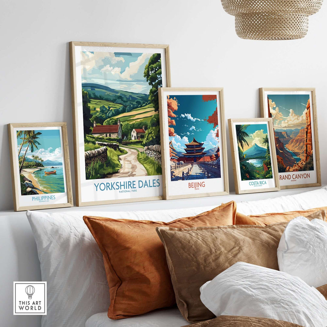 Art prints of Yorkshire Dales, Beijing, Philippines, Costa Rica, and Grand Canyon displayed in a stylish living room setting.