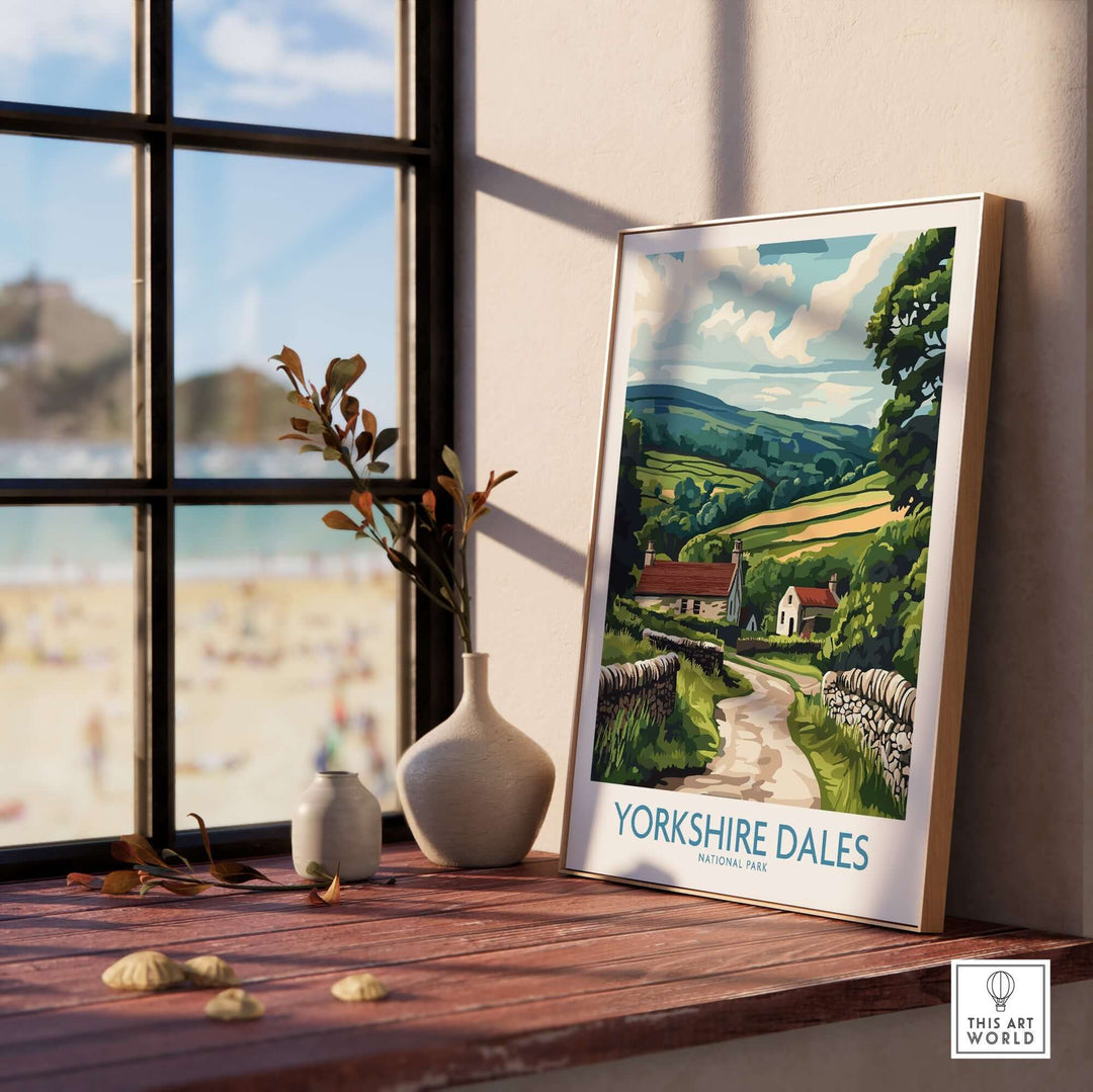 Yorkshire Dales National Park art print displayed on a wooden table near a window, showcasing vibrant landscapes and serene details.