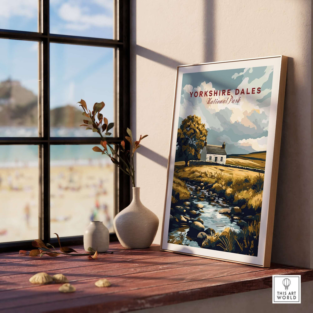 Yorkshire Dales National Park poster displayed on a windowsill, showcasing scenic countryside beauty and tranquility.