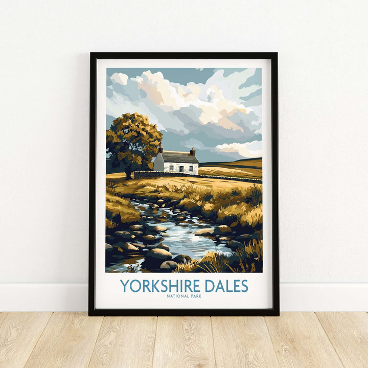 Framed print of Yorkshire Dales National Park depicting a stone cottage and serene landscape with a stream.