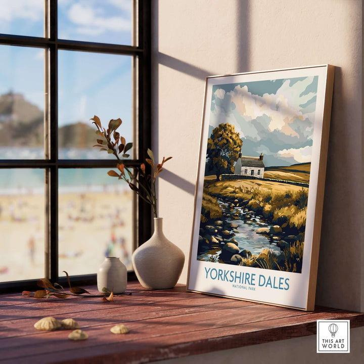 Beautiful Yorkshire Dales National Park print showcasing a stone cottage and serene landscape by a window.