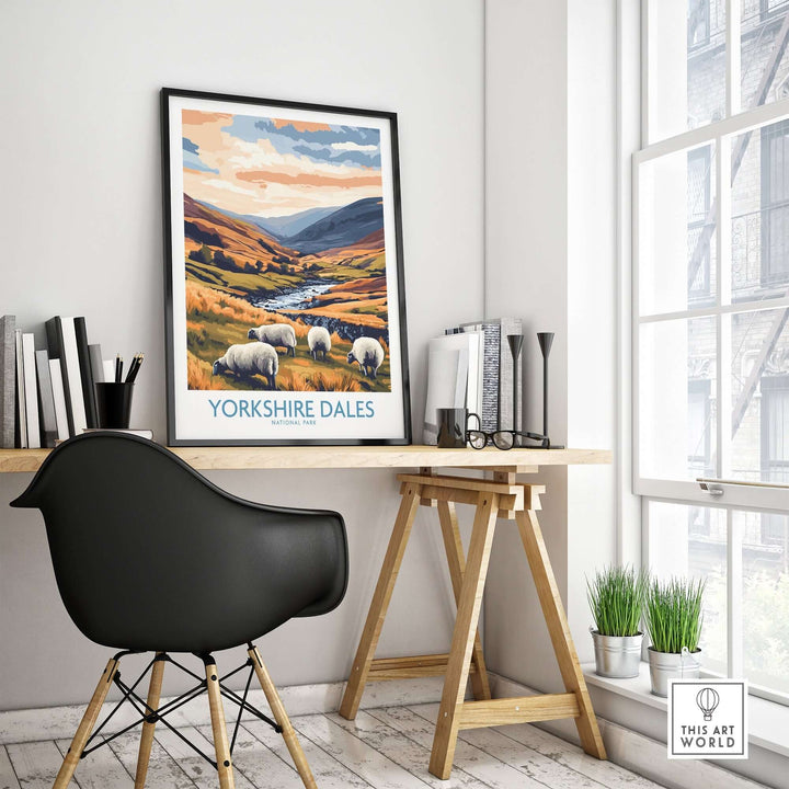 Yorkshire Dales National Park travel poster displayed in a stylish workspace with grazing sheep in a scenic landscape.