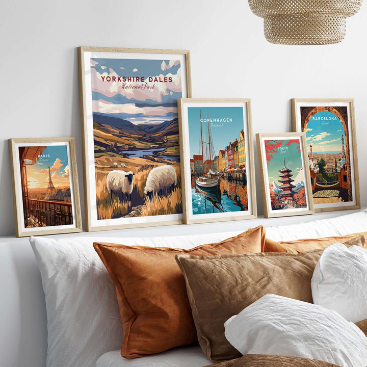 Yorkshire Dales National Park print displayed among framed art on a stylish modern bed, showcasing nature's beauty.