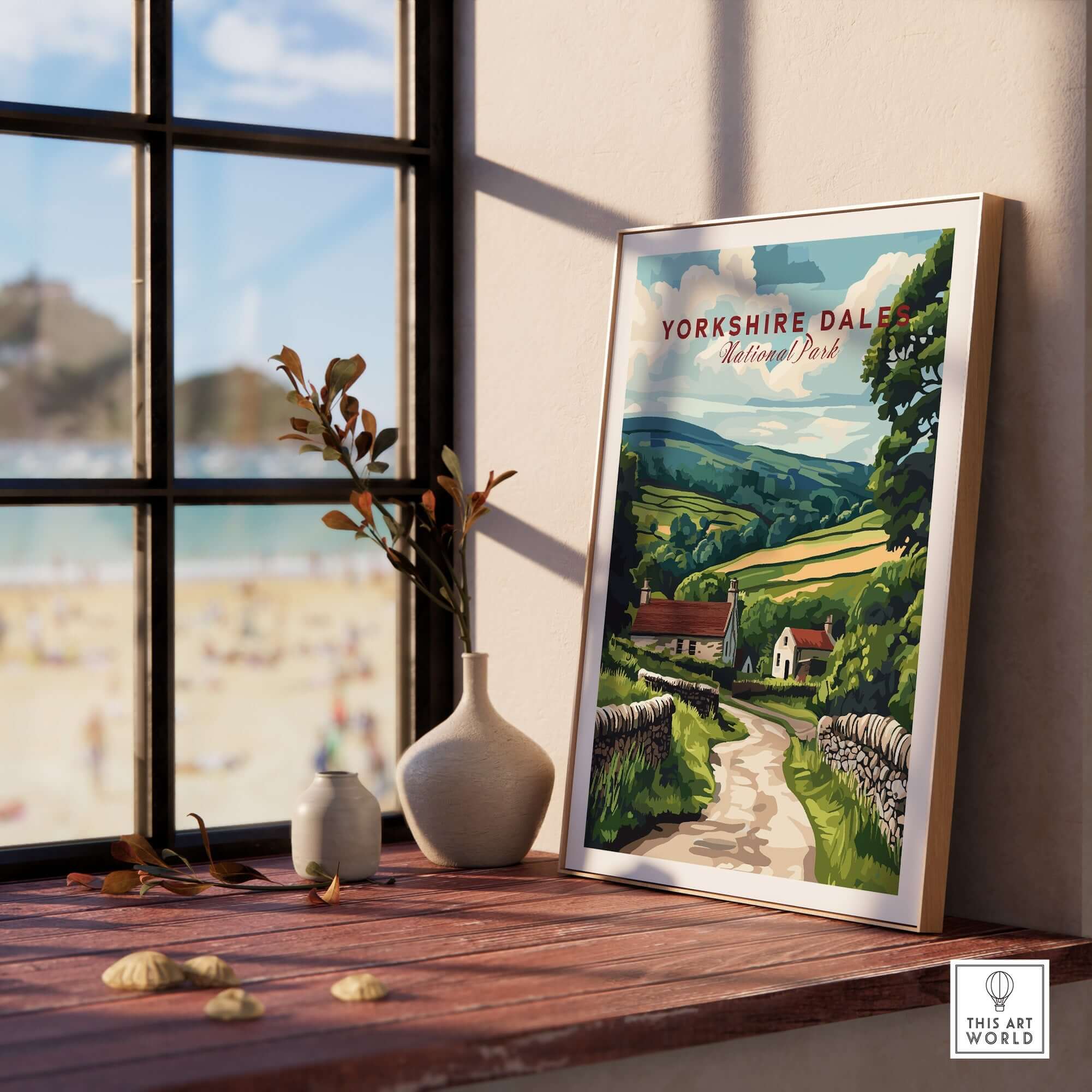 Yorkshire Dales National Park Wall Art Poster displayed in a cozy interior with a view of the beach.