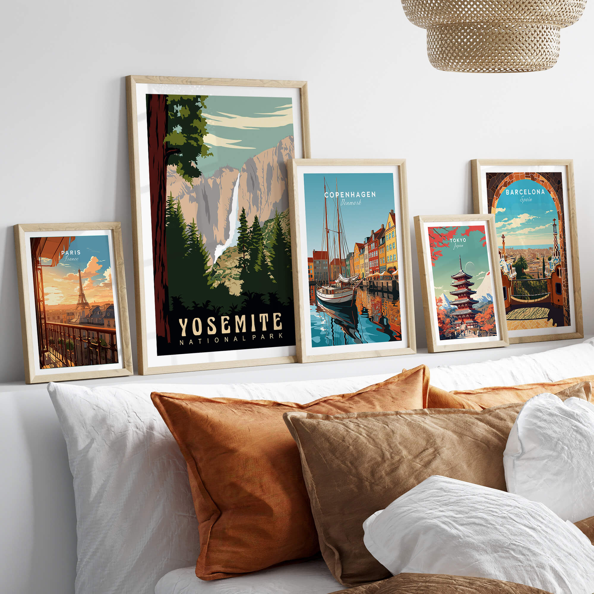 Yosemite National Park Print showcased among various framed travel prints in a cozy living room decor.