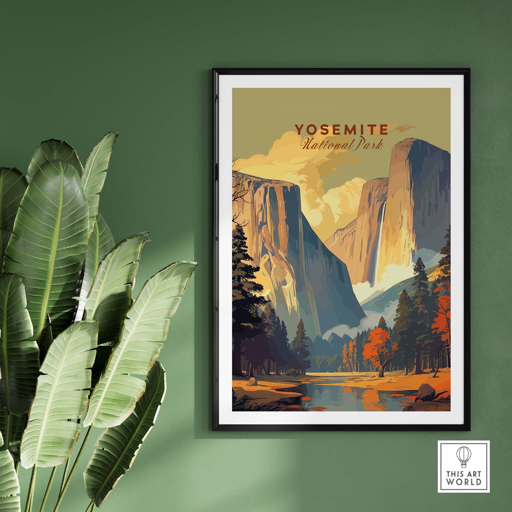 Framed Yosemite National Park print showcasing a scenic mountain landscape and vibrant fall foliage on a green wall.